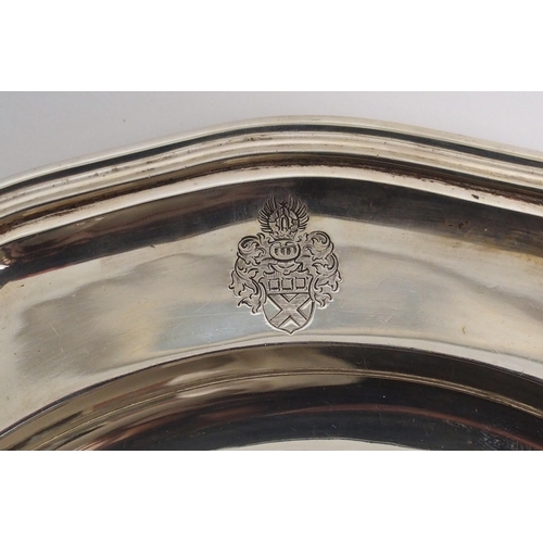 211 - A matched pair of German silver plates