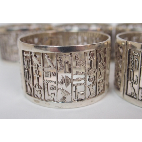 212 - A set of eight Eastern silver napkin rings