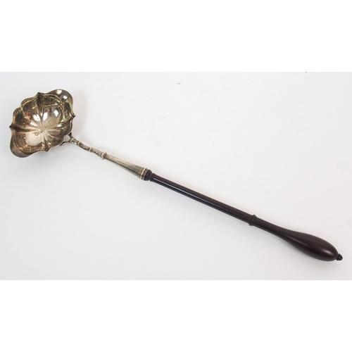 214 - An 18th Century silver bowled toddy ladle