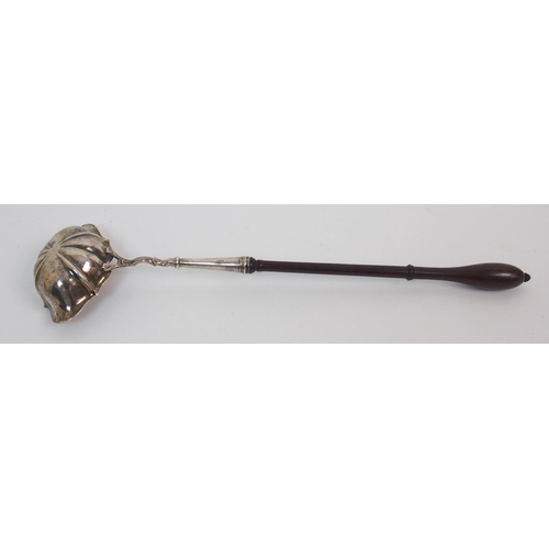 214 - An 18th Century silver bowled toddy ladle