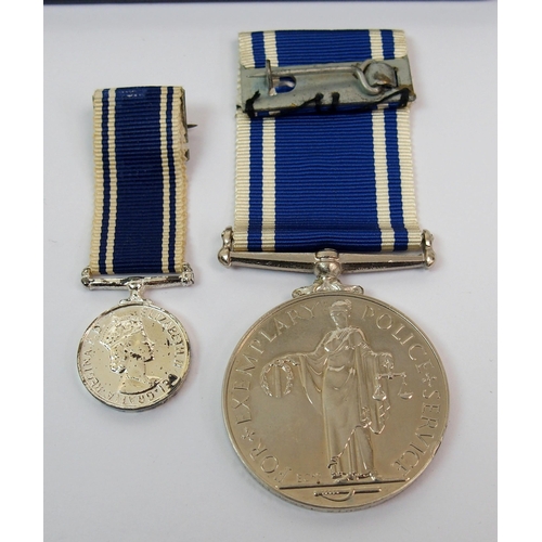 280 - A cased Queen Elizabeth II Police Exemplary Service Medal