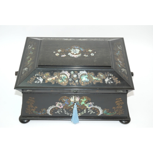 321 - A Victorian papier-mache and mother of pearl inlaid sewing box