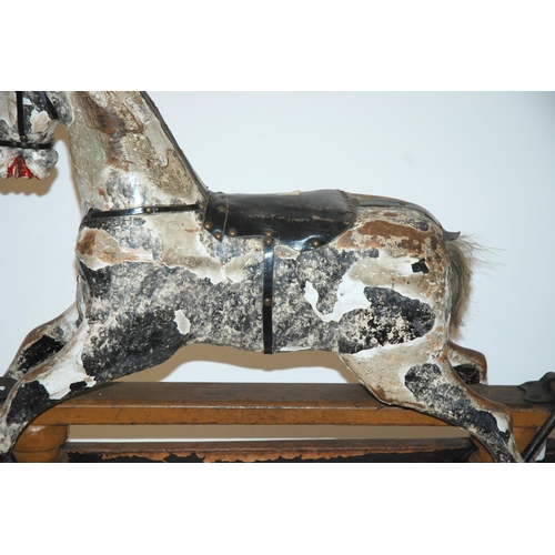 323 - An early 20th Century child's miniature rocking horse