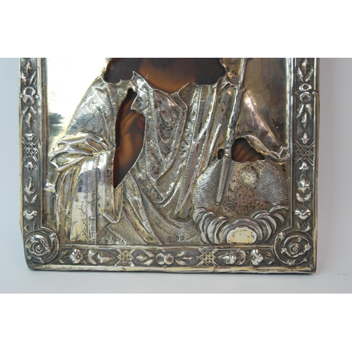 324 - A mid-19th Century Russian icon depicting Christ with Russian silver oklad