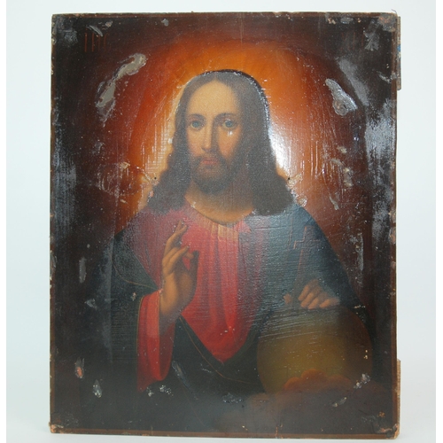 324 - A mid-19th Century Russian icon depicting Christ with Russian silver oklad