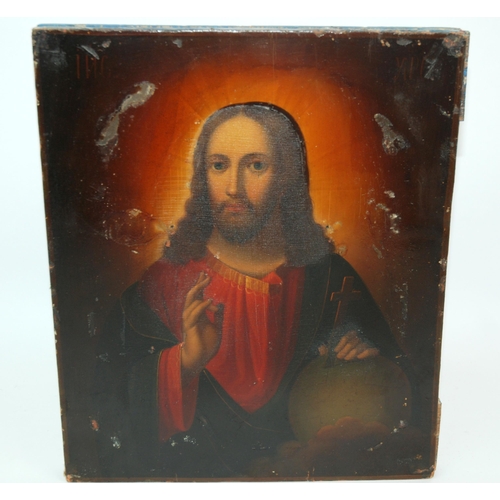 324 - A mid-19th Century Russian icon depicting Christ with Russian silver oklad