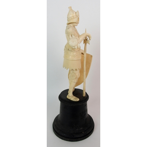 327 - An early Continental carved ivory figure of a knight