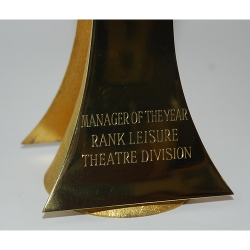 337 - A silver-gilt Rank Leisure Division Theatre Division Manager of the Year Trophy