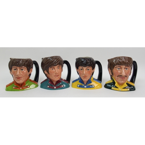 482 - A set of four Royal Doulton character jugs of the Beatles