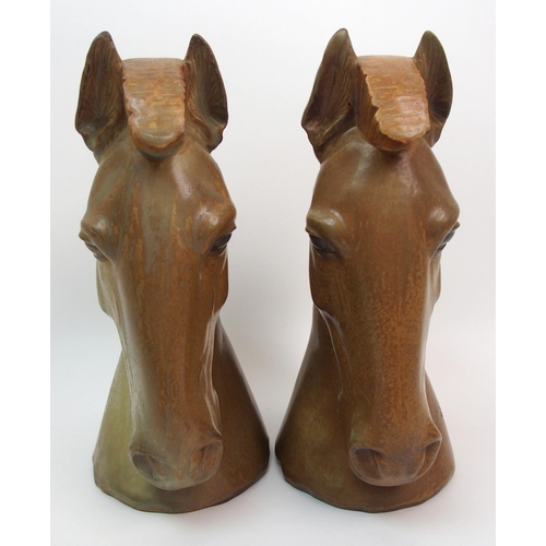 487 - A pair of Lladro horse head bookends