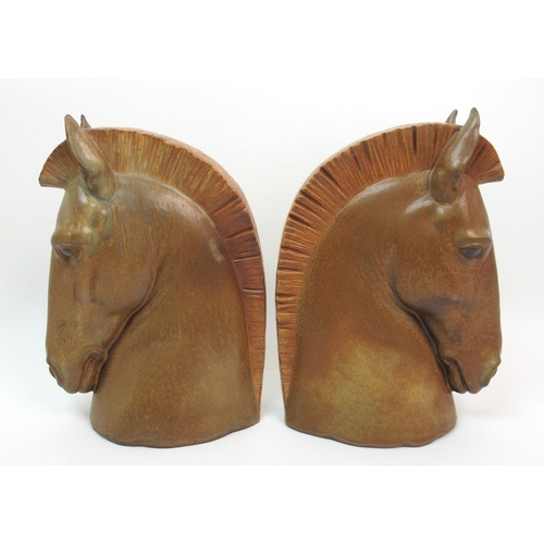 487 - A pair of Lladro horse head bookends