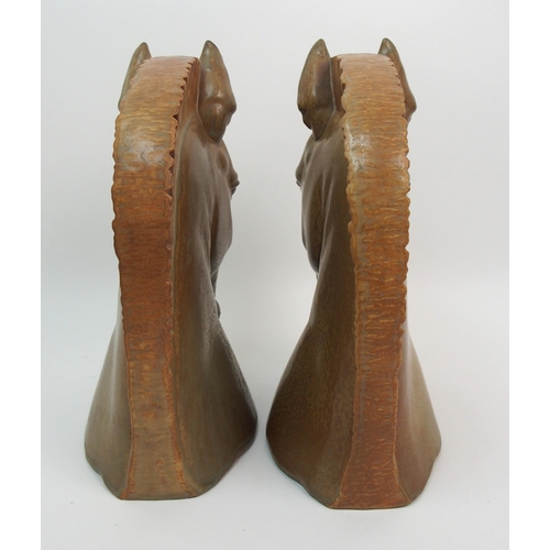 487 - A pair of Lladro horse head bookends