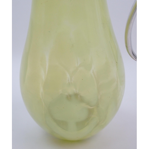 490 - A Victorian yellow vaseline glass claret jug