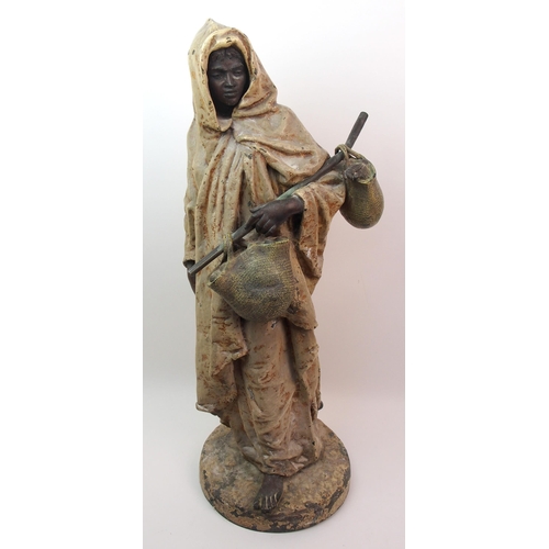 492 - A large cold painted bronzed metal figure of an Arab man