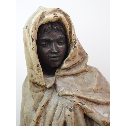 492 - A large cold painted bronzed metal figure of an Arab man