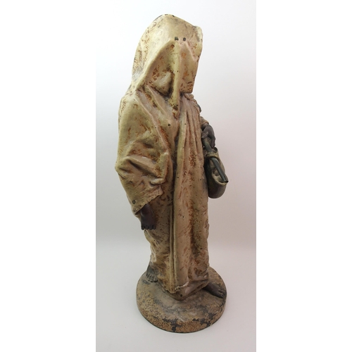 492 - A large cold painted bronzed metal figure of an Arab man