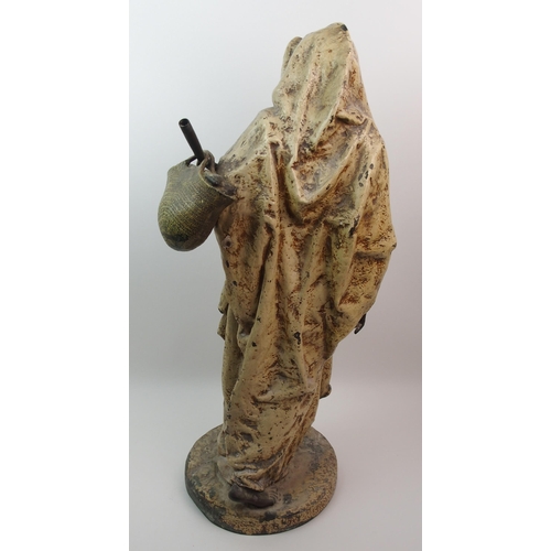 492 - A large cold painted bronzed metal figure of an Arab man