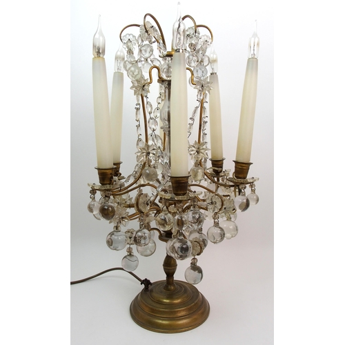 494 - A gilded metal and glass table lamp