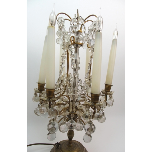 494 - A gilded metal and glass table lamp