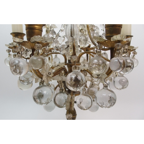 494 - A gilded metal and glass table lamp