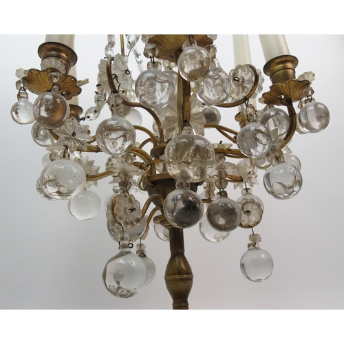 494 - A gilded metal and glass table lamp