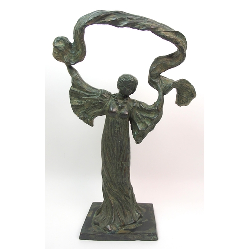 509 - A green patinated bronze of a dancing woman