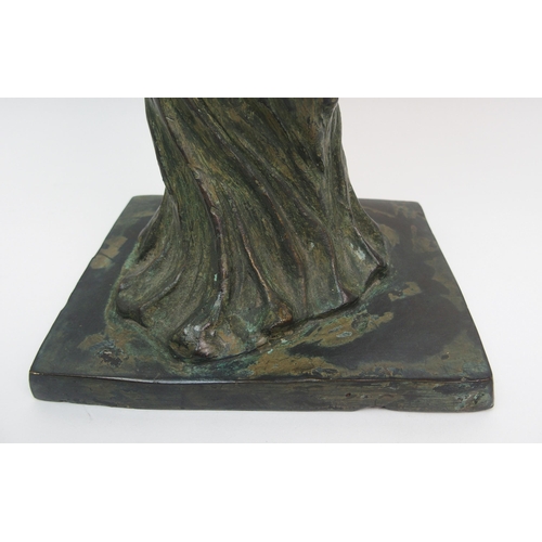 509 - A green patinated bronze of a dancing woman