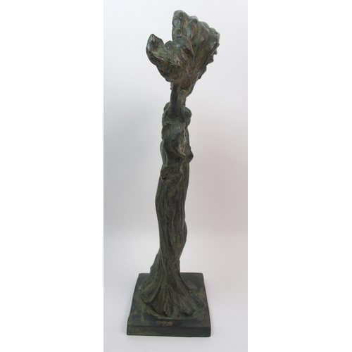 509 - A green patinated bronze of a dancing woman