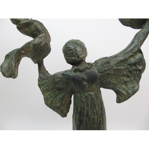 509 - A green patinated bronze of a dancing woman