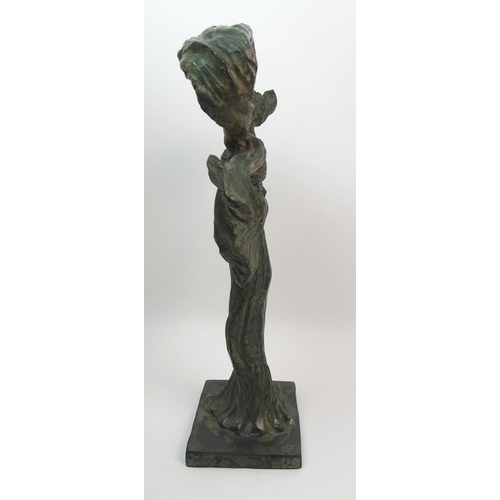 509 - A green patinated bronze of a dancing woman