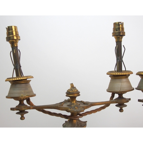 512 - A pair of French gilt bronze figural candelabras