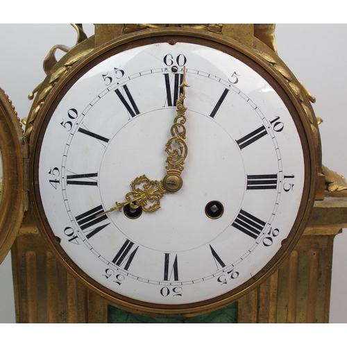 514 - A French ormolu and malachite mounted chiming mantle clock