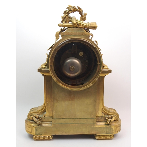 514 - A French ormolu and malachite mounted chiming mantle clock