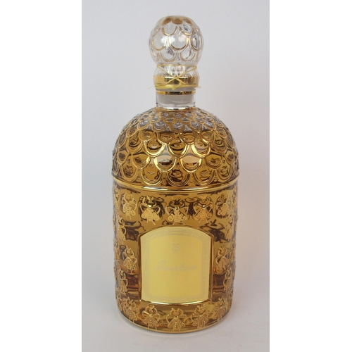 527 - A Guerlain honeycomb and bee design display perfume bottle