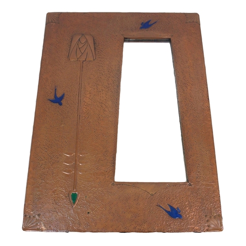 529 - An Arts and Crafts style copper framed mirror