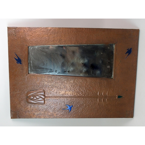 529 - An Arts and Crafts style copper framed mirror