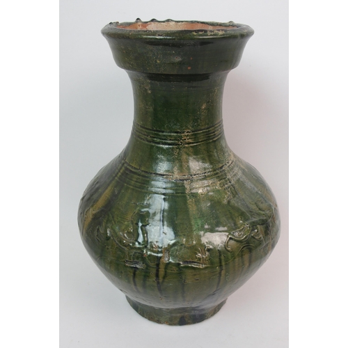 62 - A Chinese green glazed moulded vase