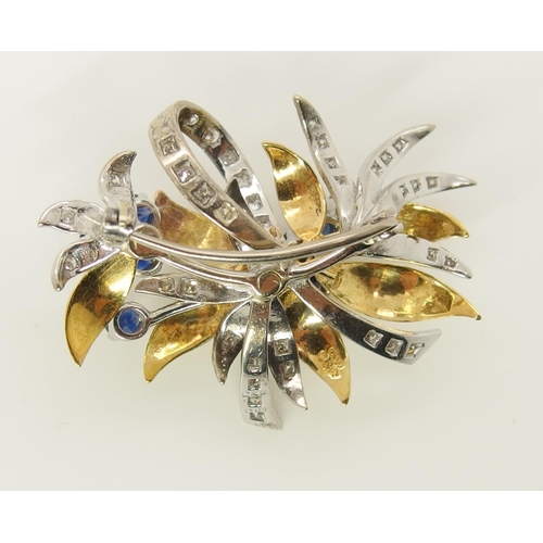 626 - An 18ct gold sapphire and diamond brooch