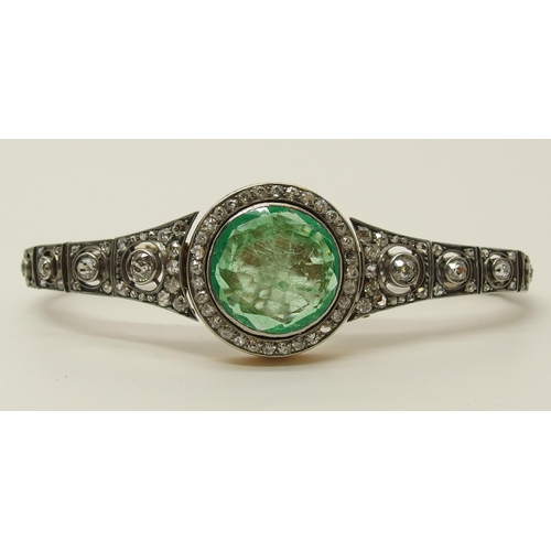 630 - An Emerald and diamond Russian bracelet