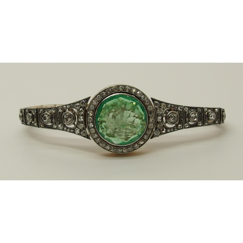 630 - An Emerald and diamond Russian bracelet