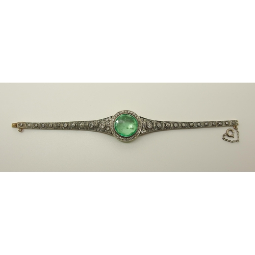 630 - An Emerald and diamond Russian bracelet