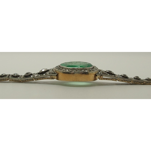 630 - An Emerald and diamond Russian bracelet