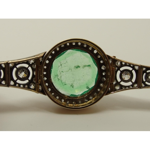 630 - An Emerald and diamond Russian bracelet