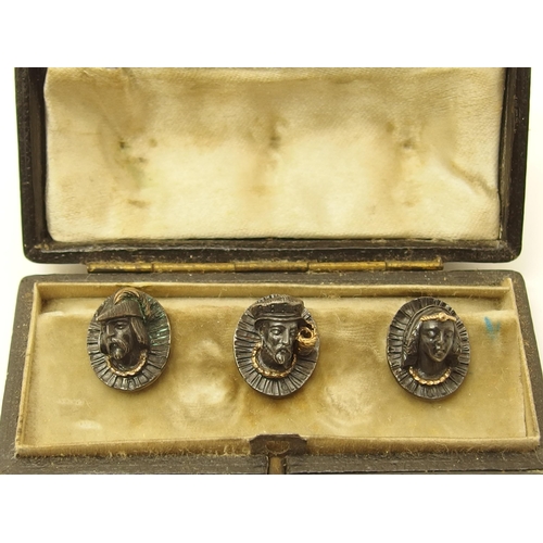 637 - A set of three French silver and gold shirt studs