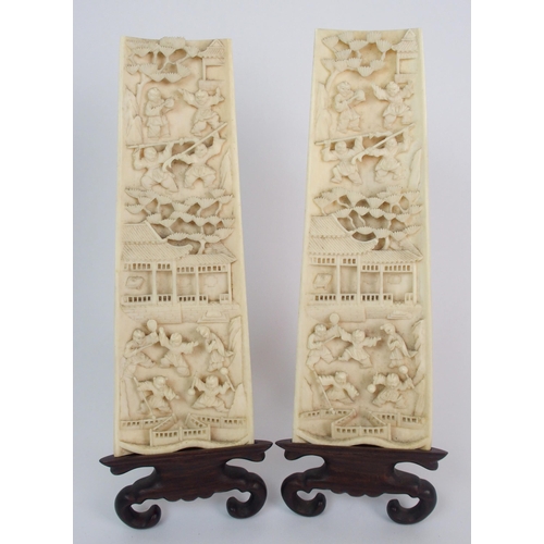 64 - A pair of Chinese ivory wrist wrests