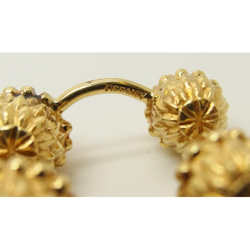 641 - A pair of 18ct gold 'Acorn' pattern Tiffany cufflinks