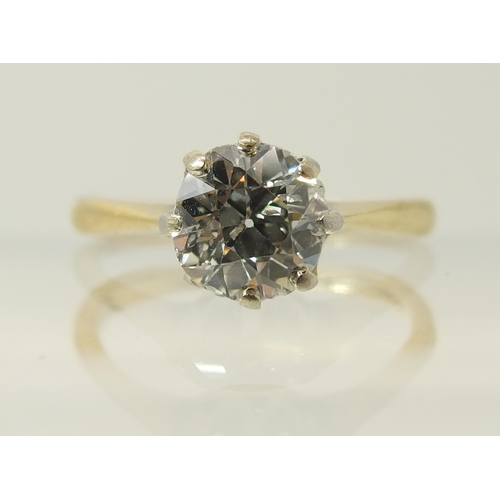 644 - An 18ct yellow and white gold diamond solitaire ring