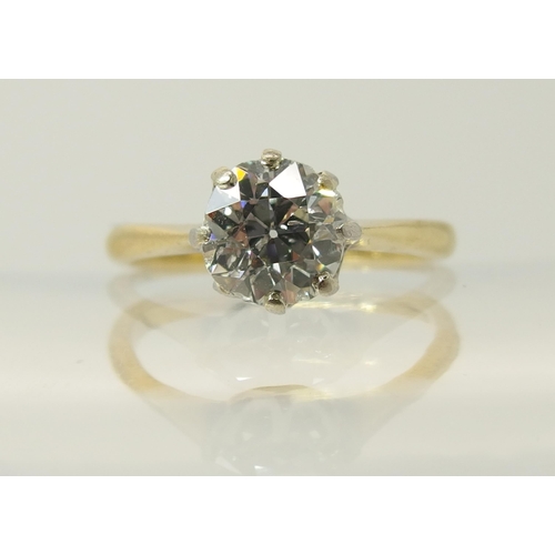 644 - An 18ct yellow and white gold diamond solitaire ring