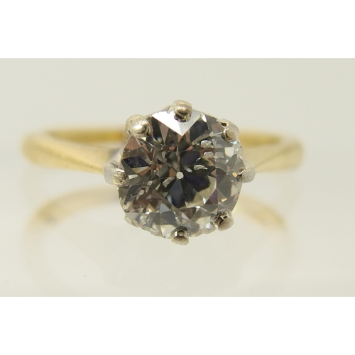 644 - An 18ct yellow and white gold diamond solitaire ring