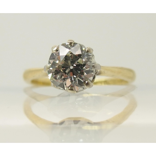 644 - An 18ct yellow and white gold diamond solitaire ring